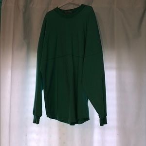 A dark mint long sleeve shirt